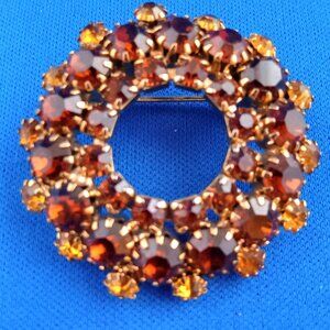 Vintage mid century pong set rhinestone circle pin brown and golden amber stones